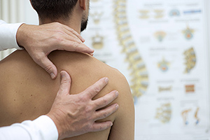 shoulder manipulation - Copyright – Stock Photo / Register Mark