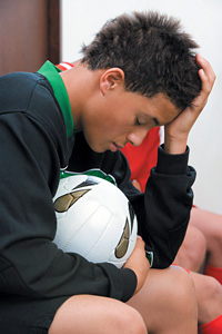 athlete with headache - Copyright – Stock Photo / Register Mark