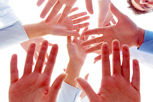 gathering hands - Copyright – Stock Photo / Register Mark