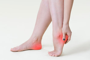 heel pain - Copyright – Stock Photo / Register Mark