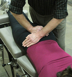 Sacral apex right adjustment - Copyright – Stock Photo / Register Mark