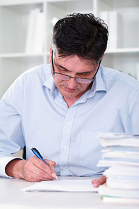 man writing note - Copyright – Stock Photo / Register Mark