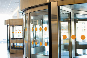 revolving doors - Copyright – Stock Photo / Register Mark