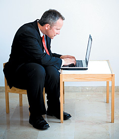 slouching guy - Copyright – Stock Photo / Register Mark